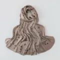 Close-up detail of pleated silk-feel scarf with delicate mini floral print texture. - 180x70cm / #A06