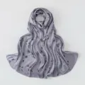 Detailed view of grey imitation silk scarf with delicate black and white floral prints. - 180x70cm / #A07