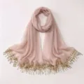 Elegant dusty pink chiffon hijab with gold sequin fringe embroidery, perfect detail shot. - A03