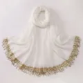 Detail shot of white chiffon scarf featuring elegant gold sequin and tassel border trim. - A13