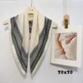 Detail view of the elegant women's paisley printed imitation silk square scarf, perfect styling. - ZM04