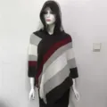 Detailed view of the knitted hooded poncho with multi-color stripes and fringe hem. - 80-100cm / Coffee and White
