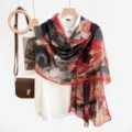 Detailed view of a Chinese style printed women's silk scarf shawl, elegant black red design. - 6#