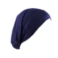 Detail view of the solid color stretchy inner hijab cap in dark blue, comfortable rayon fabric. - Navy Blue