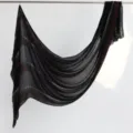 Black cut-out printed cotton linen scarf with fringed edges, elegant shawl for women. - Black