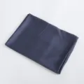 Dark blue satin fabric detail shot, smooth shiny texture, elegant textile material display. - 04 Navy Blue