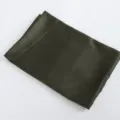 Detail view of dark green satin fabric texture, smooth and glossy textile material closeup. - 07 Deep Green