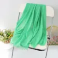 Vibrant green solid color linen scarf shawl with tassel fringe, versatile lightweight beach wrap. - Style #6