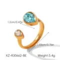 Gedetailleerd overzicht van open geometrische roestvrijstalen ring met zirconias. - Open Peer Stijl (XZ-R30662-BE)