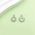Pendentifs soleil creux en alliage argent antique, accessoires DIY pour bijoux et colliers. - Pendentif Soleil (10941)