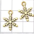Vintage gold snowflake charms for DIY jewelry making, bracelet and earring accessories. - Antique Gold Christmas Snowflake