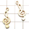 Gold treble clef charm pendant detail view, perfect for DIY handmade jewelry crafting. - Music Note / 1 Piece/Pack (10x26mm) / Gold