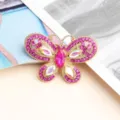 Superbe charm papillon en cristal plaqué or avec des strass roses éclatants pour les ongles. - Rose rouge