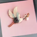 Chinese style flying crane bird enamel brooch pin with pearl pendant for apparel decor. - Crane with Pearl Style (MM302)