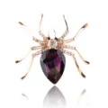 Prachtige paarse kristallen spinnenbroche met fonkelende strass-steentjes, insect. - Goudkleur + Violet