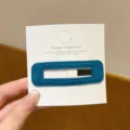Detailed view of dark teal velvet hair clip, stylish autumn winter side barrette accessory. - Square Shape / 1 Piece / Blue
