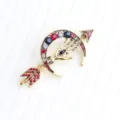 Vintage gold tone evil eye hand crescent moon arrow rhinestone brooch pin for fashion apparel. - Gold