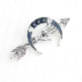 Vintage silver crescent moon arrow palm eye brooch with blue clear rhinestones lapel pin. - Silver