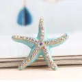 Turquoise enamel starfish brooch with colorful rhinestones, marine beach vacation jewelry item. - Blue