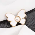 Butterfly waist tightening buckle pearl alloy jeans adjustable decorative button accessory. - White