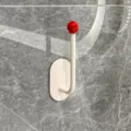 Punch-free wall hook with red ball, minimalist adhesive storage hook for home bathroom use. - Dopamine Funny Big Lips Hook / China Red