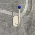Adhesive wall hook with blue ball tip, decorative hanging rack for home organization. - Dopamine Funny Big Lips Hook / Deep Sea Blue