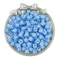 Detailed shot of light blue acrylic cube beads in a silver tray for DIY handmade jewelry. - 50 Pieces/Pack / Blue