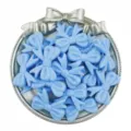 Close up detail of light blue acrylic bow beads in silver tray, perfect for DIY jewelry crafting. - Blue