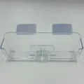 Clear wall-mounted glasses storage box with adhesive backing, ideal for sunglasses. - Clear