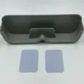 Grey plastic glasses storage holder with two adhesive pads for wall mount sunglasses display. - Gray