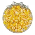 Detailed shot of 6x9mm yellow white swirled pony beads, ideal for hair braiding and DIY crafts. - Orange
