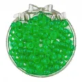 Close-up detail of transparent green barrel pony beads arranged neatly in a silver bow tray. - Green