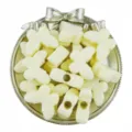 Detail close-up of acrylic butterfly large-hole beads and spacer beads on a decorative tray. - Beige