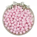 Close up of pink frosted acrylic round beads with straight holes, perfect for DIY jewelry craft details. - 6mm, Hole 1mm (100 Pcs/Pack) / Pink