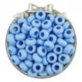 Closeup of light blue acrylic large hole beads inside a decorative silver bowl for DIY crafts. - 30 Pieces/Pack / Blue