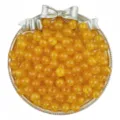 Detailed view of translucent jelly yellow acrylic round beads, perfect for DIY jewelry. - Orange