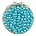Detailed view of light blue ABS imitation pearls in a decorative silver tray for DIY jewelry. - Aquamarine