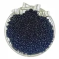Close-up of black glass seed beads in silver bow tray for DIY jewelry accessories design. - 2mm Size / Black
