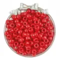 Detailed view of glossy red plastic barrel pony beads in silver decorative tray for DIY crafts. - 6x9mm, 4mm Hole (100 Pcs/Pack) / Bright Red