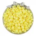 Detail shot of yellow 6x9mm pony beads, large hole barrel beads for hair braiding and DIY jewelry. - 6x9mm, 4mm Hole (100 Pcs/Pack) / Light Yellow