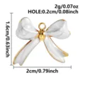 Gold-trimmed white enamel bow pendant stainless steel DIY jewelry accessory component charm - White Gold