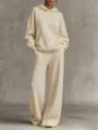 Vista completa de un conjunto de sudadera con capucha oversize crema y pantalón ancho - S / Top Y Pantalón / Albaricoque