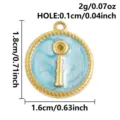Colgante redondo de acero inoxidable con gota de aceite accesorio de joyería detalle. - Dorado Fondo Azul Llave