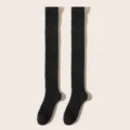 Chaussettes hautes duveteuses en polaire corail noire, chaudes hiver et douillettes. - Taille unique / Noir