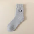 Graue Herren Wollsocken, dicke thermische Wintersocken mit Markenetikett, kuschelige Variante. - Einheitsgröße / Hellgrau