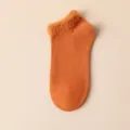Comfortable women's short socks with soft fuzzy cuffs, solid orange casual daily wear. - One Size (35-42) / Orange Red