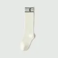 White calf socks for women, stylish JK long socks featuring black stripes and letter design. - One Size / Flat Calf Style / Cream