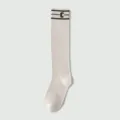 Beige knee high socks for women, preppy style striped cotton long socks with letter C. - One Size / Flat Extended Style / Beige