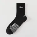 Men's black mid-tube athletic basketball socks with anti-slip grip and shock-absorbing towel sole. - One Size / Black With White Label