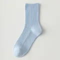 Light blue ribbed crew socks for women, breathable cotton knit socks, comfortable daily wear. - Blue